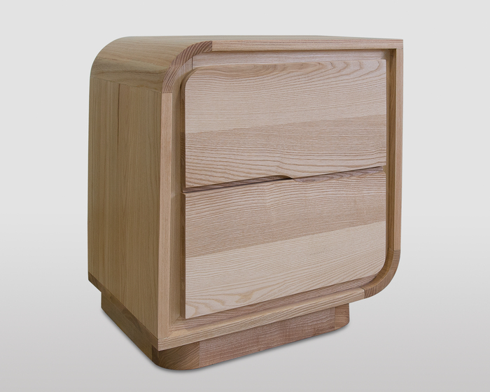 Two-drawer nightstand in solid ash wood. Contemporary design and artisanal craftsmanship.