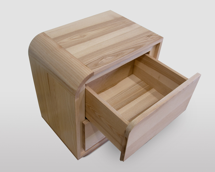 Two-drawer nightstand in solid ash wood. Contemporary design and artisanal craftsmanship.