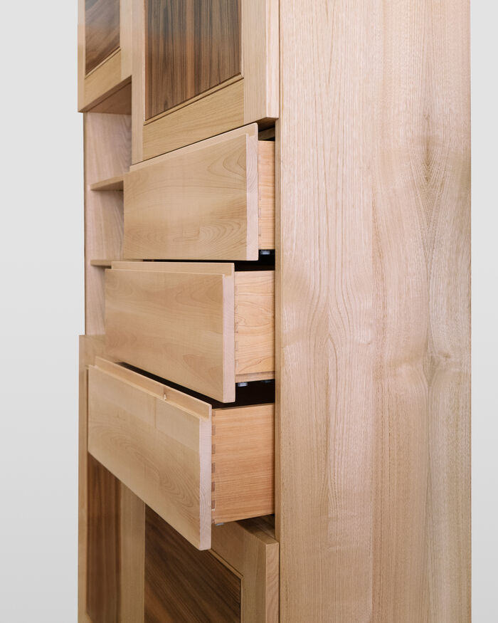 Handcrafted Storage Unit with Asymmetric Design: Doors, Open Shelving, and Drawers